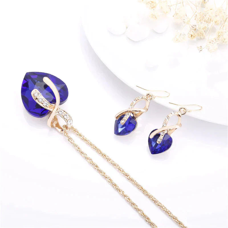 Set Halsketting + Oorbellen van Liefde met Blauwe Zirkonia in Goud