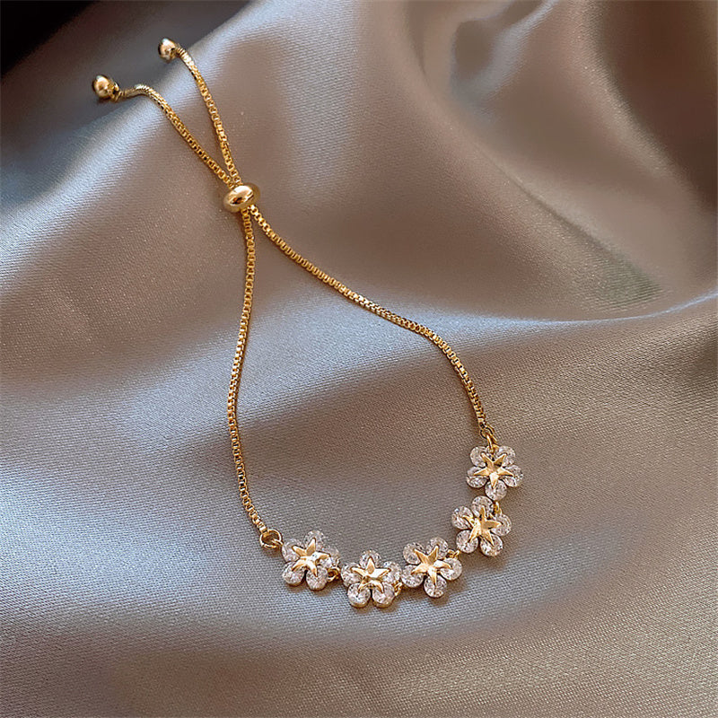 Kristallen Daisy Armband in Goud