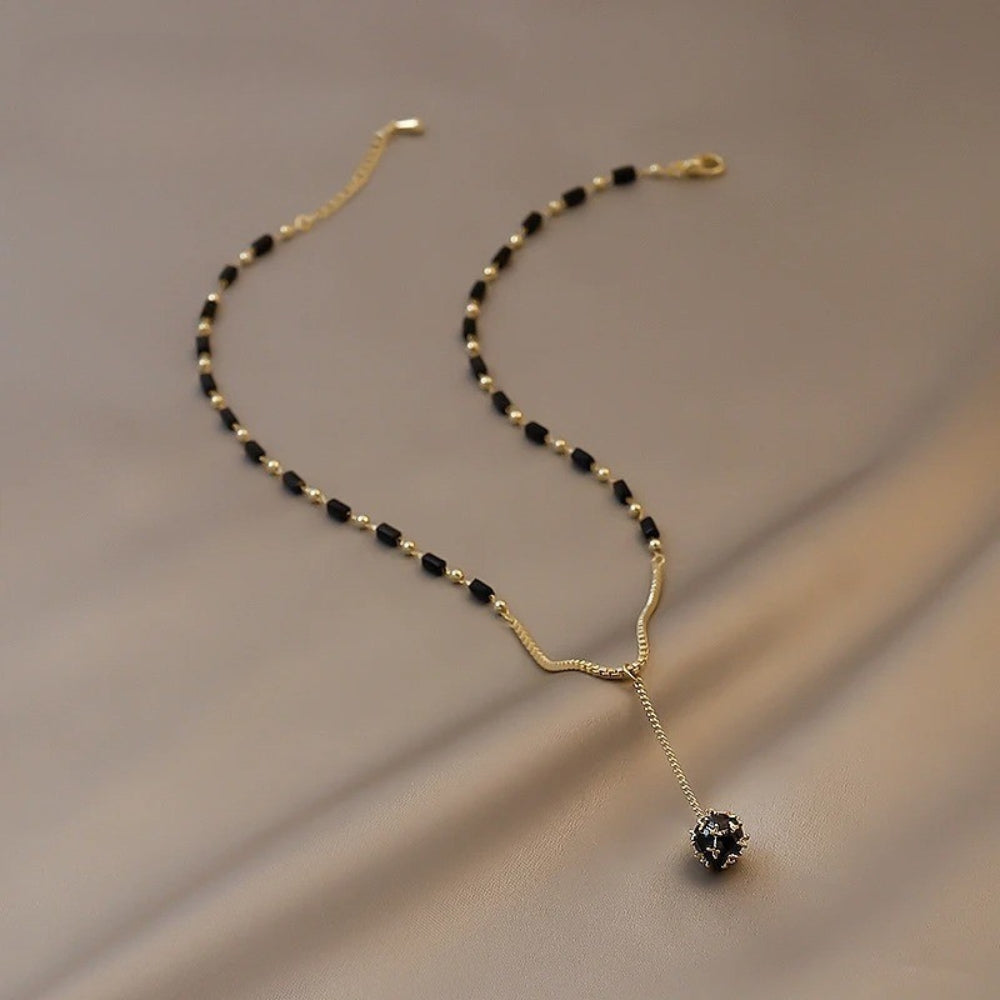 Vintage Gouden Zwarte Kralen Dangle Ketting