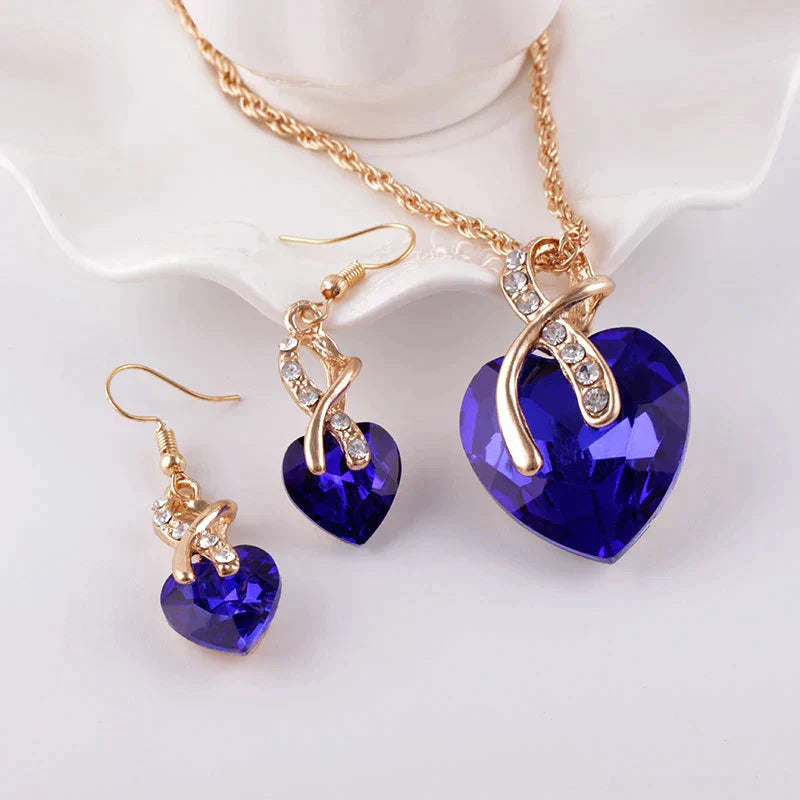 Set Halsketting + Oorbellen van Liefde met Blauwe Zirkonia in Goud
