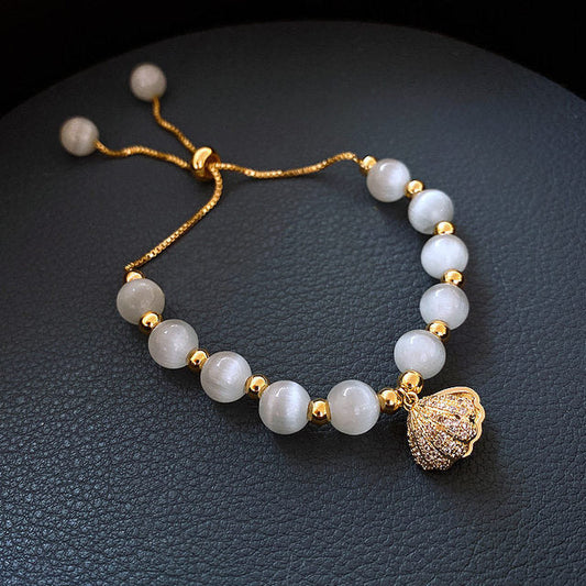Schelp Armband met Parel in Goud