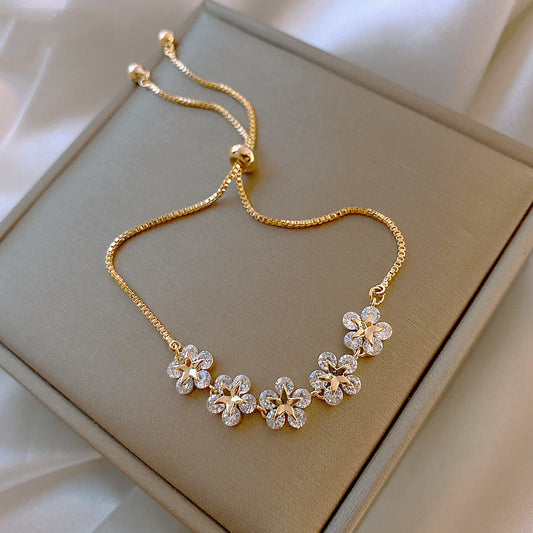 Kristallen Daisy Armband in Goud