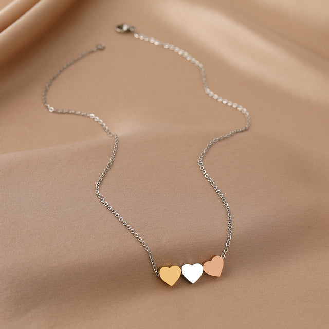 Drievoudige Hart Ketting in Goud
