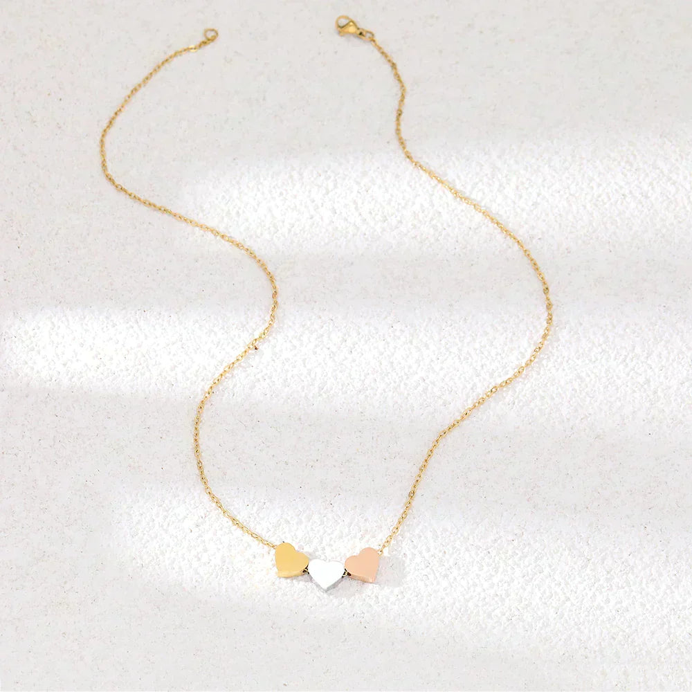 Drievoudige Hart Ketting in Goud