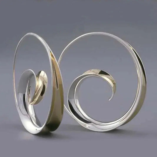 Vintage oorbellen met spiraalgolven