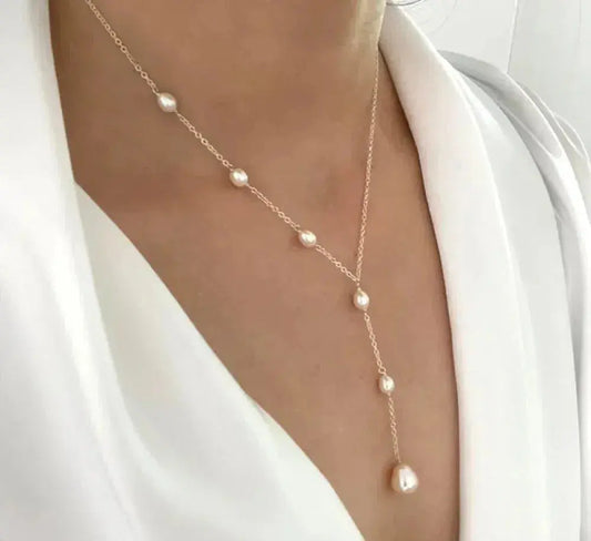 Elegante vintage ketting met hanger en parels